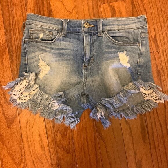 Sneak peek size medium distressed shorts with embroidery lining on the sides - Picture 1 of 11